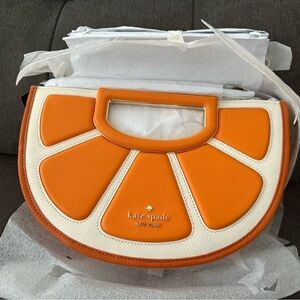 Kate Spade Orange and Cream Clutch